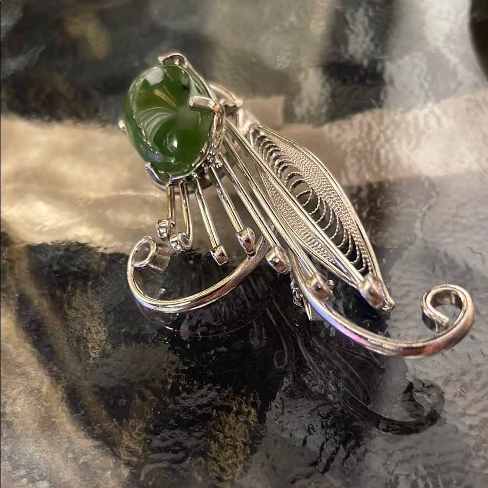 Elegant Silver Filigree Ring with Green Stone